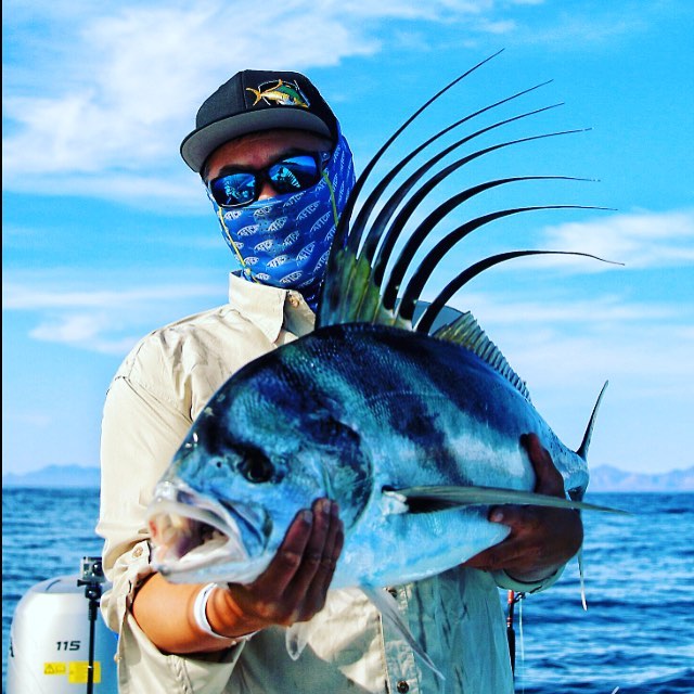Joe Sarmiento of SoCalSalty.com with a Rooster fish-Gary C Graham photo