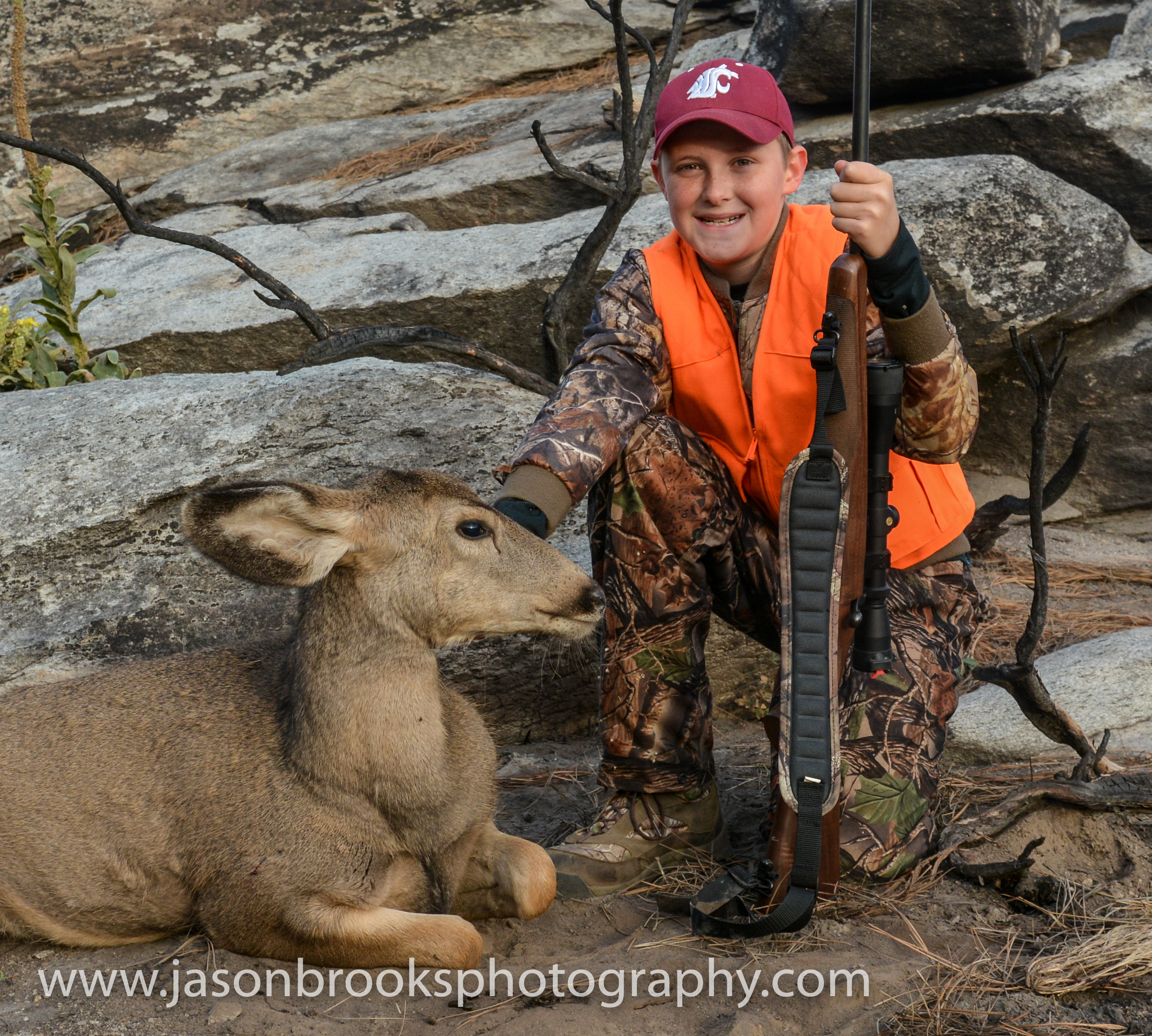 Adam Brooks with his first deer, a muley doe, and a successful hunt-Jason Brooks